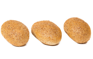 three dietary buns on a white background. bun of wholegrain 