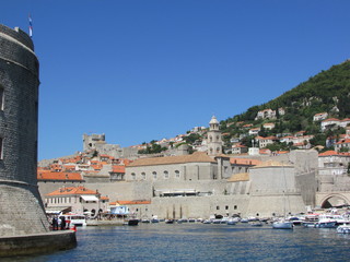Fototapeta premium Dubrovnik old port in summer and fort st. Ivan, Croatia