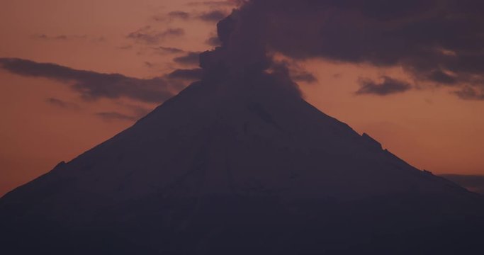Sunset time of smoke flowing out of Popocatepetl Volcano in Puebla, Mexico. 