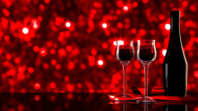 Red wine with bokeh Background.