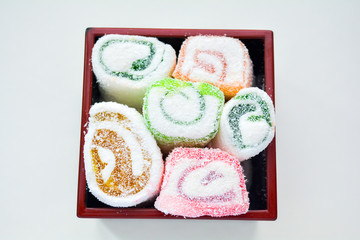 Delicious rolls of Lokum with fruit marmalade in japanese style in black box