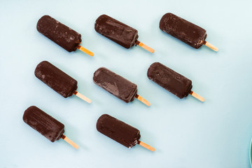 chocolate ice cream on a light blue background