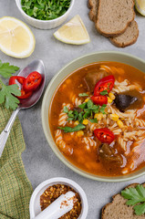 Thick red soup with pasta