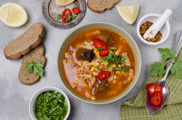 Thick red soup with pasta