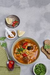 Thick red soup with pasta