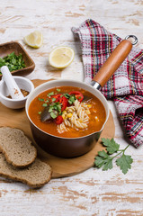 Thick red soup with pasta