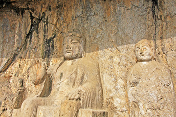 Longmen Grottoe : Trikala Buddha (Moya Three Buddha cave) The world heritage site, Chinese Buddhist...