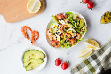 Flatlay food. Top view. Fresh salad lying in white plate
