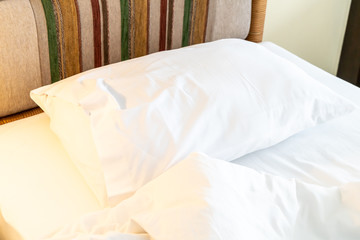 Fototapeta na wymiar Rumple pillow on bed