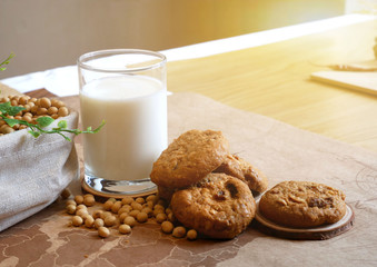 Breakfast with glass of soy milk and cookies. Food and healthy concept.