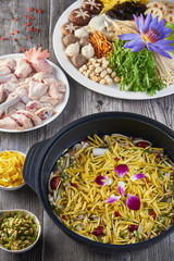 Chicken soupChicken soup set with flowers with flowers