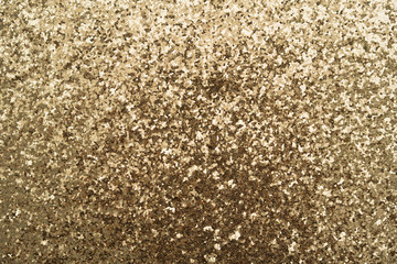 Sparkling gold color surface is a background image. 