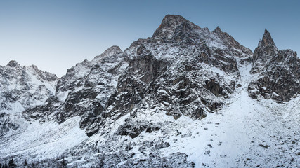 Fototapeta na wymiar Winter mountains. Snowy mountain peak