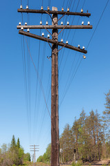 old wooden power line pole