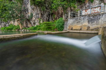 Water flowing from the dam, catchment area in countryside Thailand