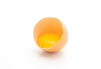Cracked egg and shell on a white background