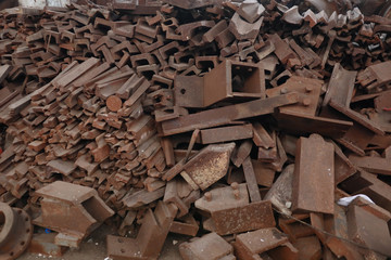 Scrap steel is cut just pieces of equal length stack .