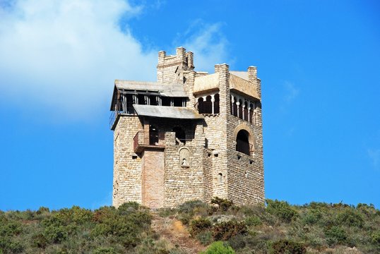 Folly in the countryside originally built as a water tower near Alhaurin El Grande, Spain.