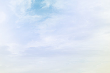 Sun and cloud background with a pastel colored
