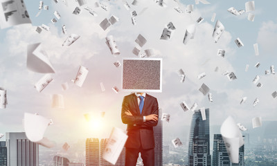 Businessman with monitor instead of head.