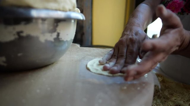 Woman doing Mexican tortillas