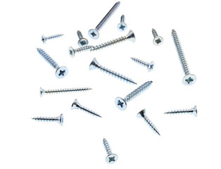 pile of screws on white background