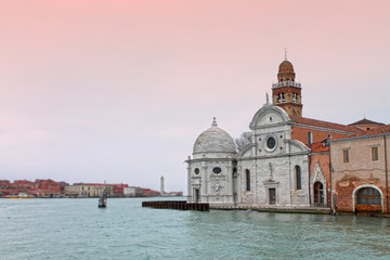 Fototapeta na wymiar San Michele church on island of San Michele in Venice. Famous venetian cemetery. Italy, Europe.