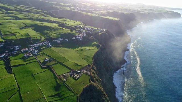 Azores, Portugal. Flying over the scenic coast of Sao Miguel (San Miguel), a Portuguese island in the Azores archipelago of the Atlantic ocean. The island is often called "The Green Island" and