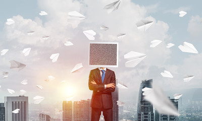 Businessman with monitor instead of head.