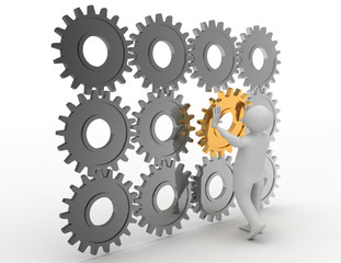 3d person is putting the special part of an engine of cogs