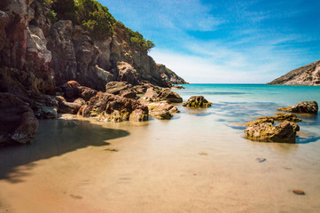 Fototapeta na wymiar Calasetta beach Cala during sunshine in summer Sardinia mediterranean Sea coast wonderful seaside