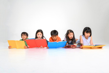 KID EDUCATION CONCEPT, READ BOOK, PLAY TOY, PLAY SMART PHONE, USE COMPUTER