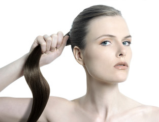 portrait of beautiful woman with brunette long healthy strong hair and clean face