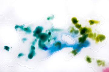 multicolored watercolor streaks and stains. background for design