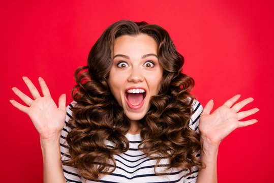 Close up portrait of cheerful yelling with voice she her girl glad black friday finally started wave amazing hair on shoulders white striped pullover isolated on red bright vivid background