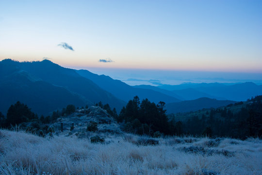 Mount Annapurna at dawn on Poon Hill in Nepal among prayful tags