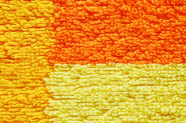 Soft orange texture of towel. Cotton towel background and texture