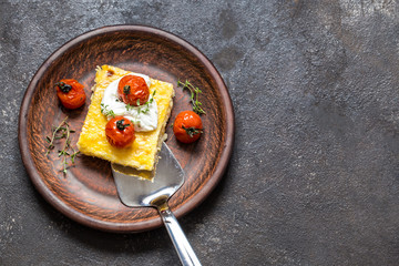 polenta with baked tomatoes and cream cheese