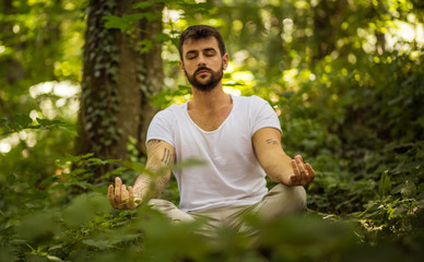 Naklejka na ściany i meble His body and mind feel the peace of nature.