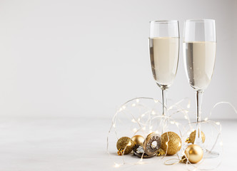 Pocket watch and champagne glasses © Irina Burakova