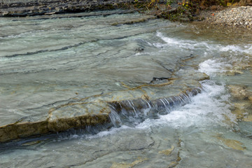 water flowing over rocks