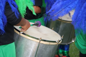 percussion instruments feathers and carnival embroidery