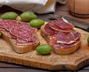 sandwiches with smoked sausage salami and jamon