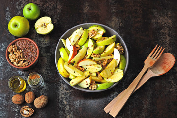 Healthy color vegan salad in a bowl. Apple salad with seeds and spices. eco salad.