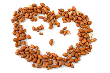 Dried and beautifully lying peanuts on a white background.