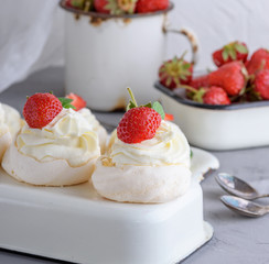 baked meringue with cream and fresh strawberries