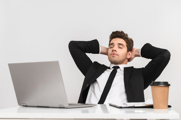 Handsome young business man wearing suit