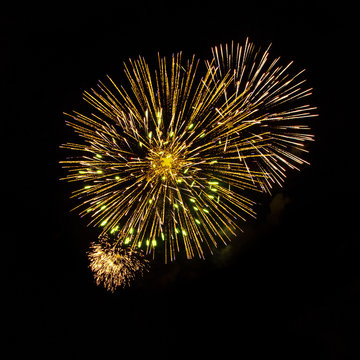 Beautiful Yellow fireworks isolated on black background