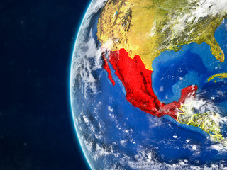 Mexico from space on model of planet Earth with country borders and very detailed planet surface and clouds.