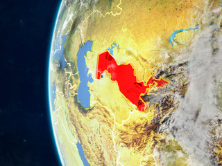 Uzbekistan from space on model of planet Earth with country borders and very detailed planet surface and clouds.